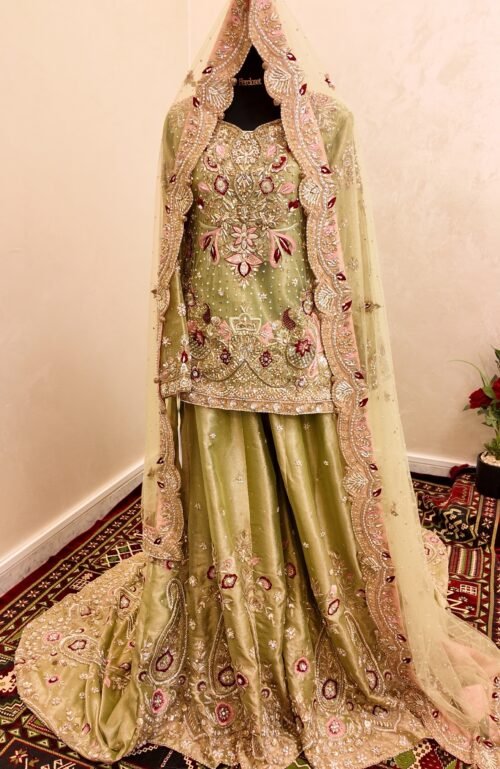 Zarmishadar bridal dress in pistachio green with pink floral embroidery
